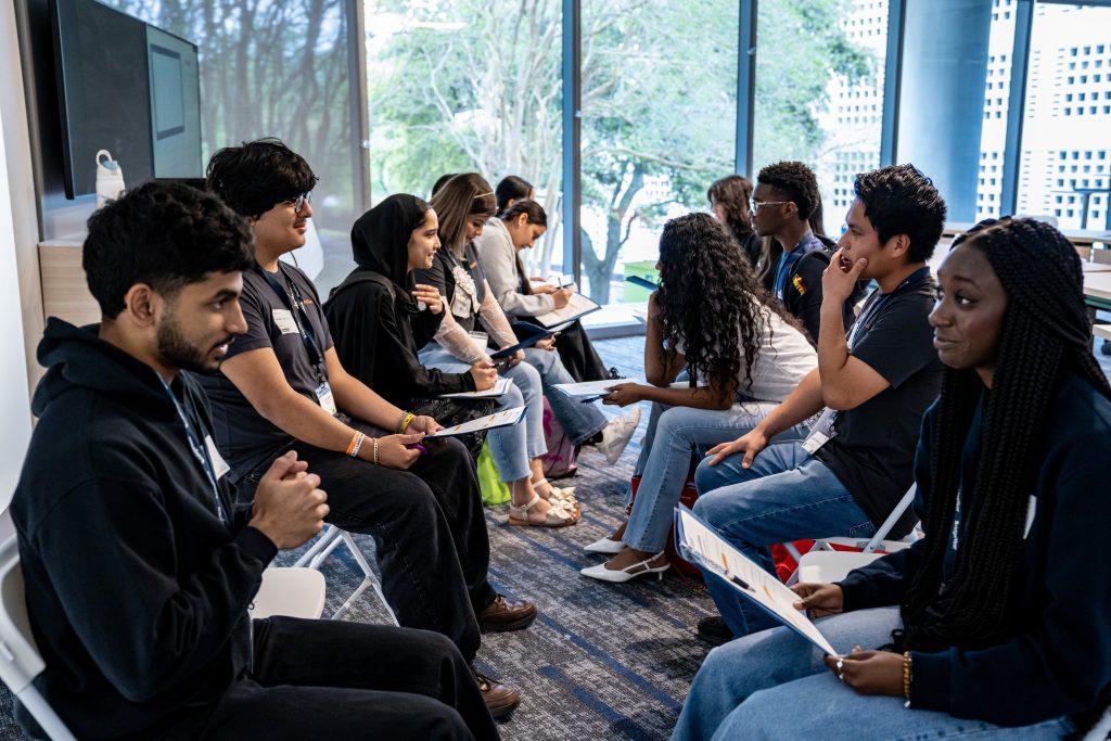Students engaging in mock interview practice during BridgeYear's Essential Soft Skills for Success (ES3) Conference, developing workplace communication skills and gaining confidence for future career opportunities.